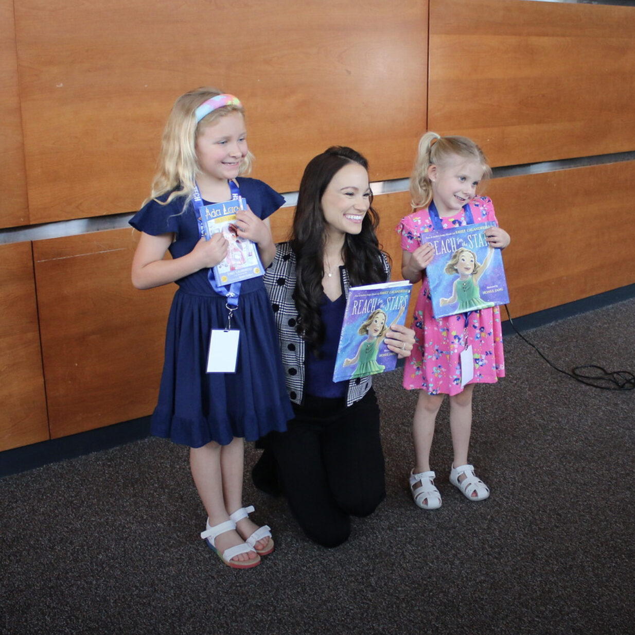 Kids holding books